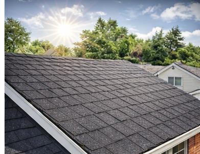 Roofer installing shingles on a roof
